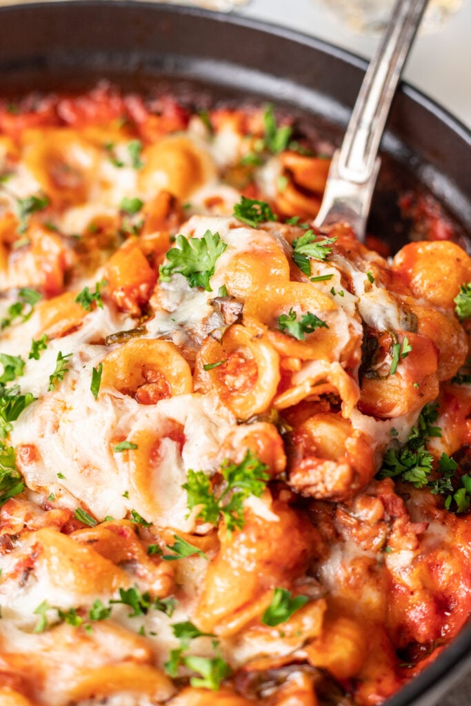 cheesy pasta scooped with a spoon