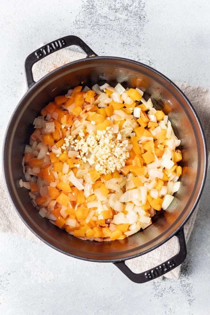 ground turkey and garlic and carrots in skillet