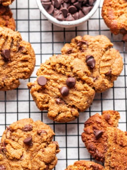cookies with chocolate chips on a cooling rack