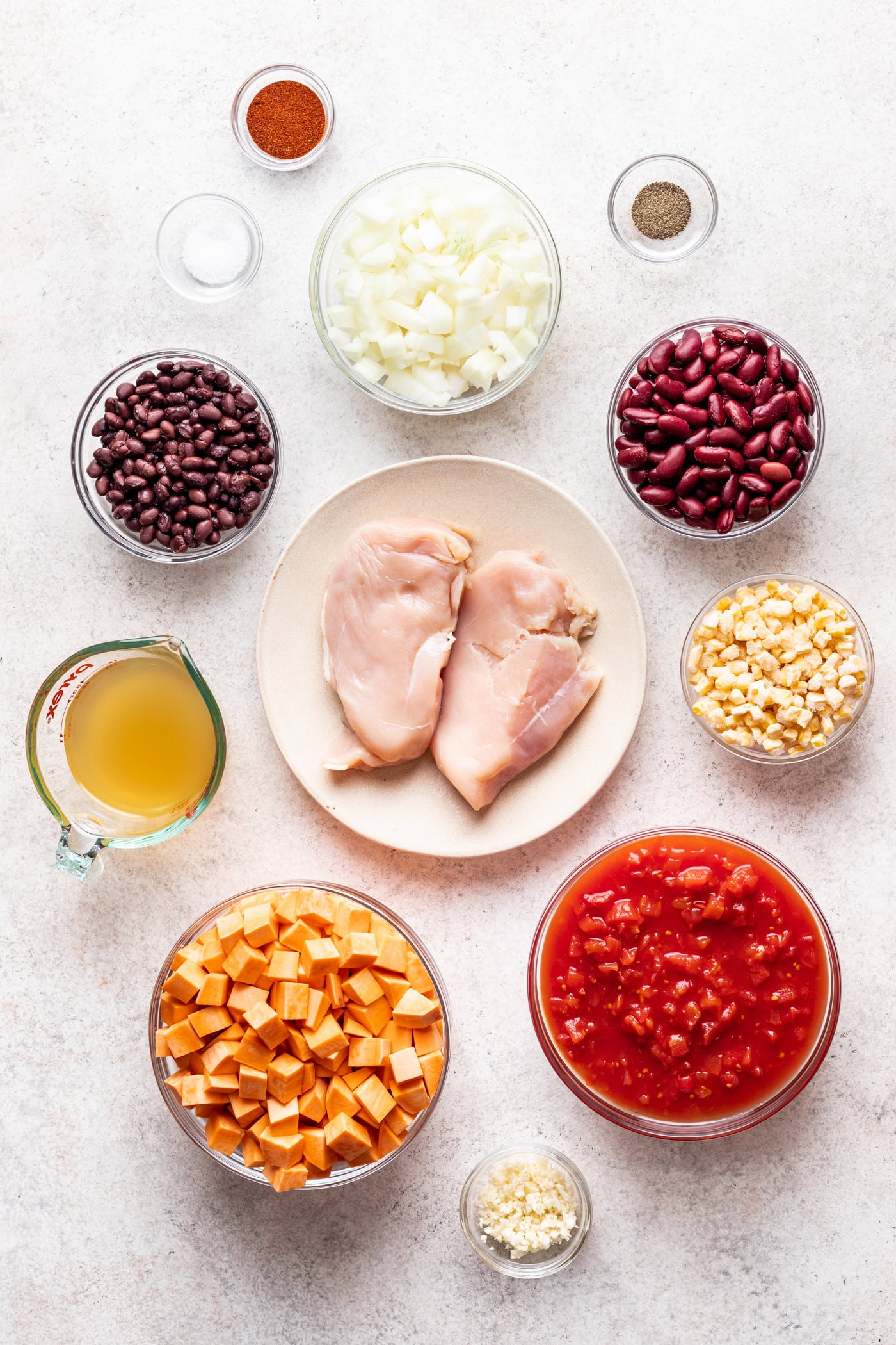 bowls of ingredients on a grey background