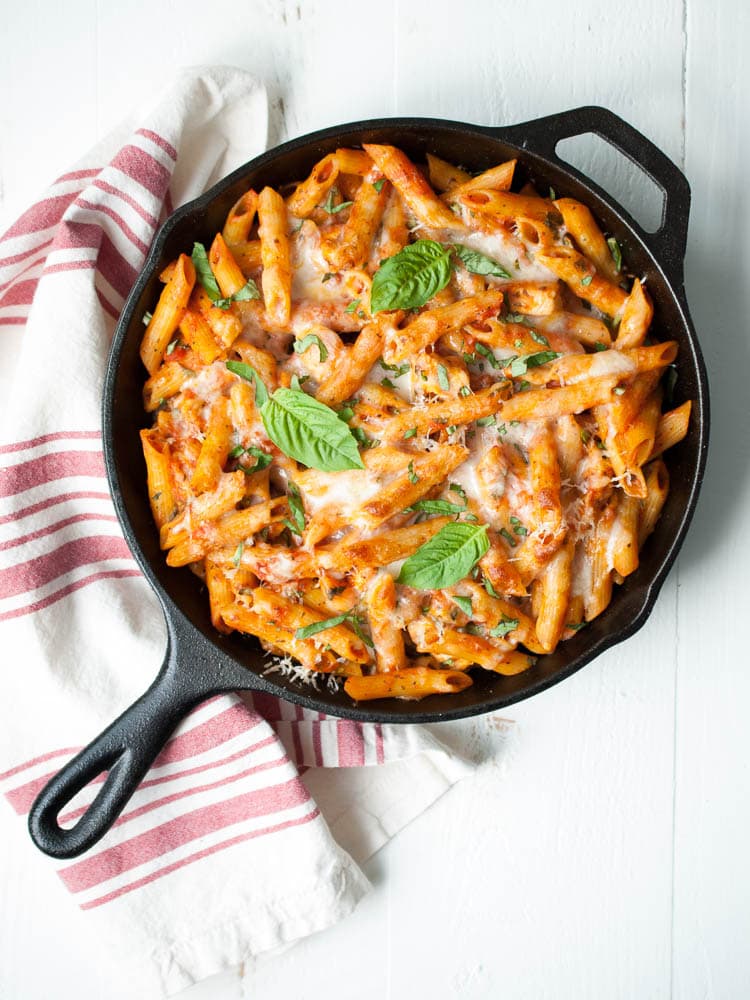 baked ziti in a cast iron skillet