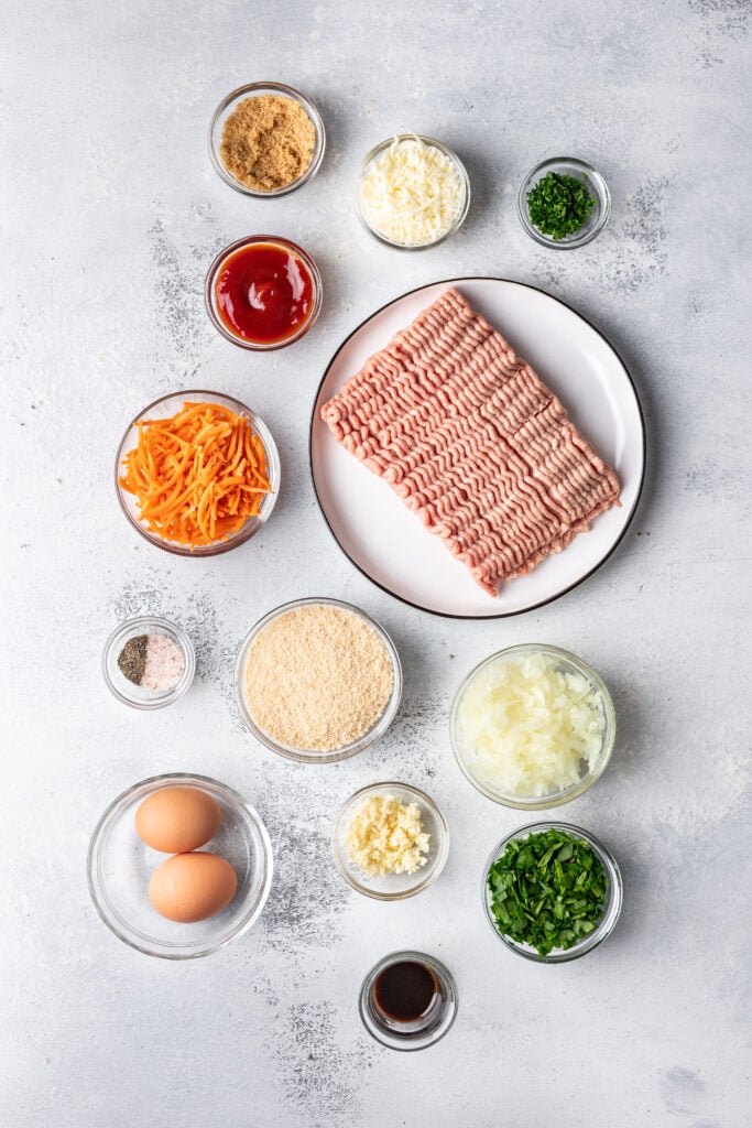 ingredients for turkey meatloaf in small bowls