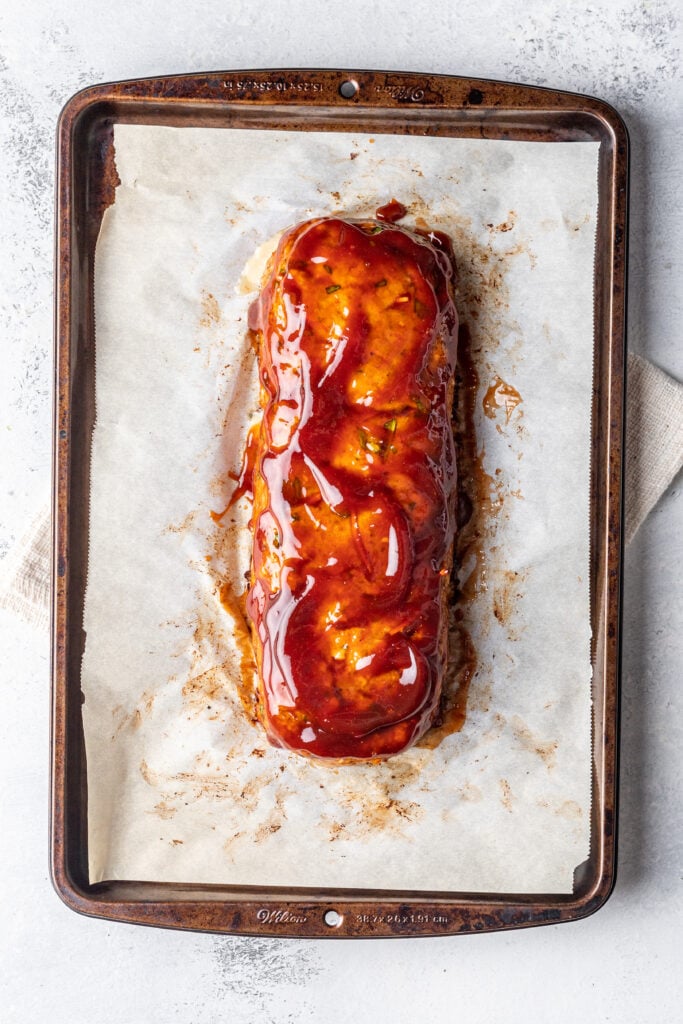 turkey meatloaf on a sheet pan with glaze