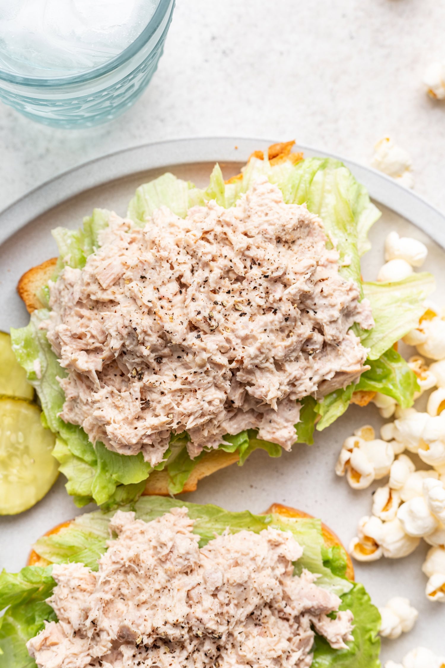 tuna on a piece of bread with lettuce