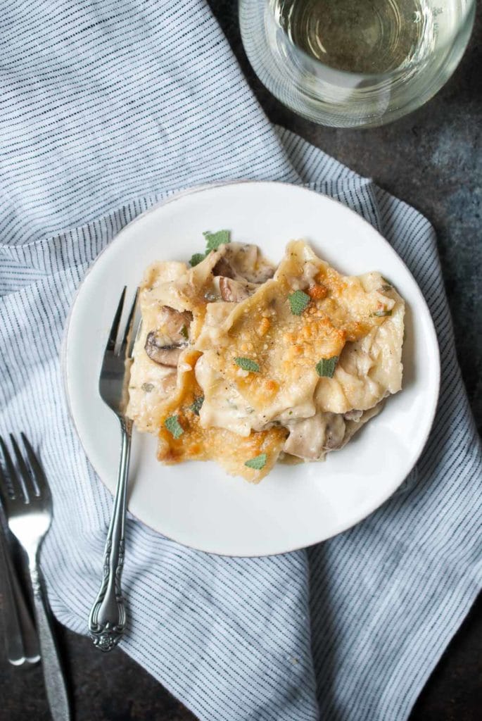 Mushroom Sage Lasagna on a plate with a fork