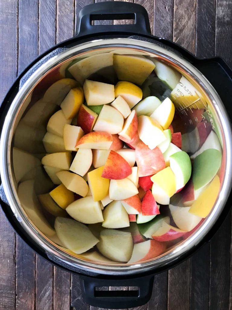 overhead shot of chopped up apples in an instant pot