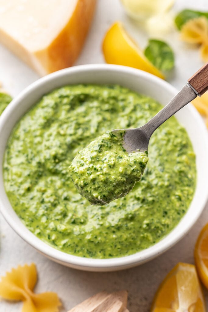 pesto in a bowl and scooped onto a spoon