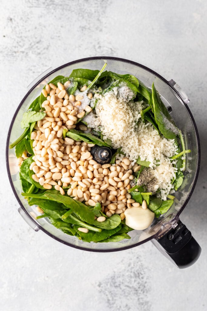 pesto ingredients in a food processor