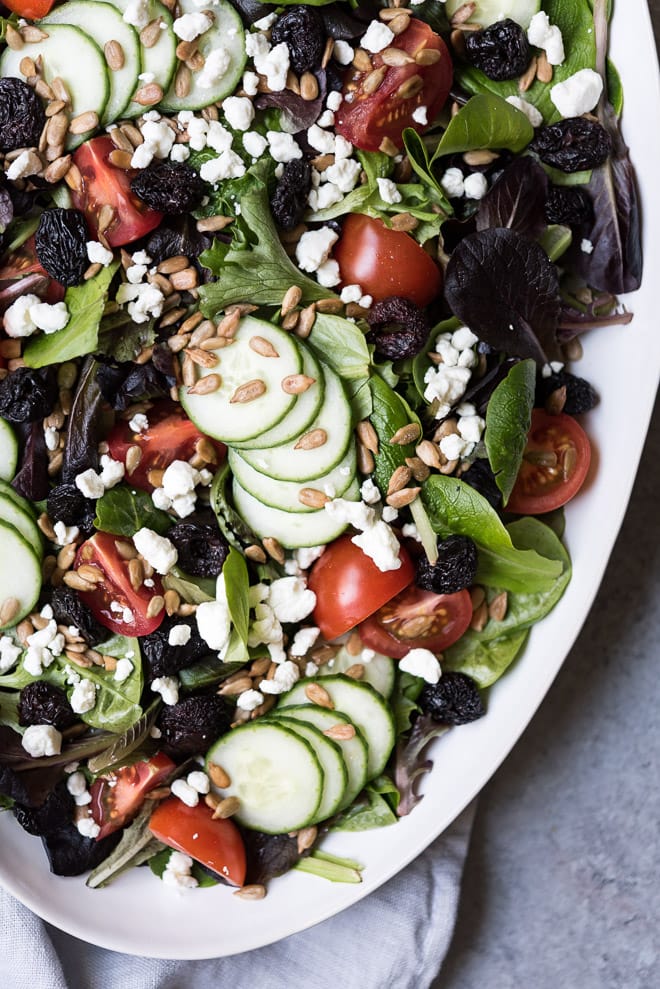 close up of spring mix salad on a platter