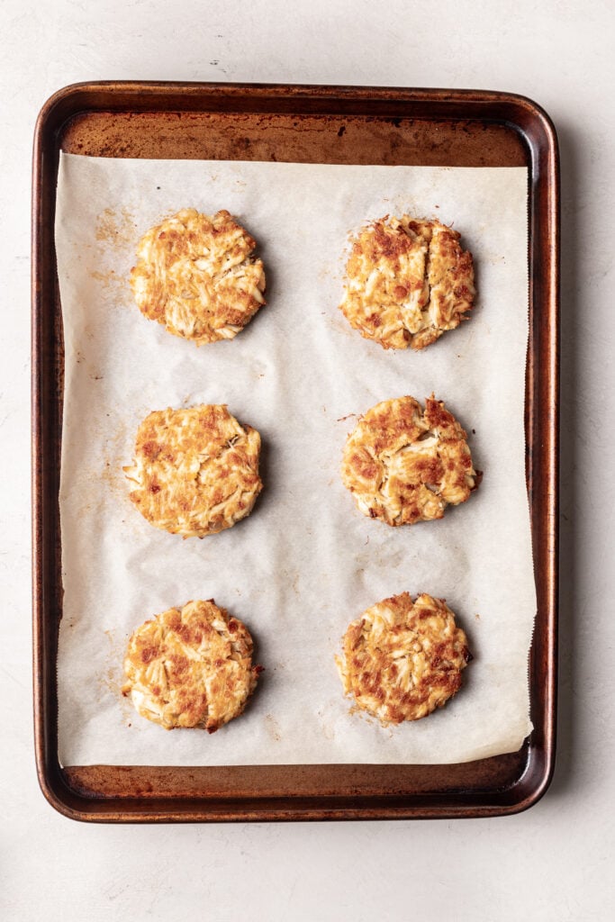 baked crab cakes on a sheet pan