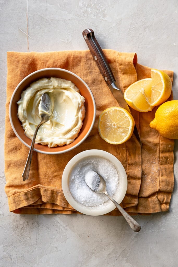 Bowl of Mayonnaise, Fresh Lemon, and Salt for Crab Cake Sauce