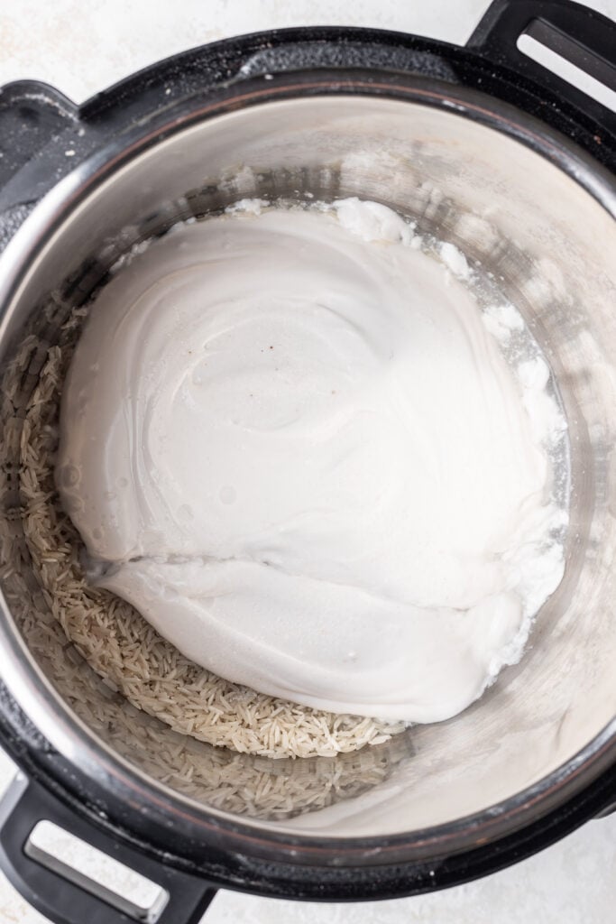 rice and coconut milk in an instant pot