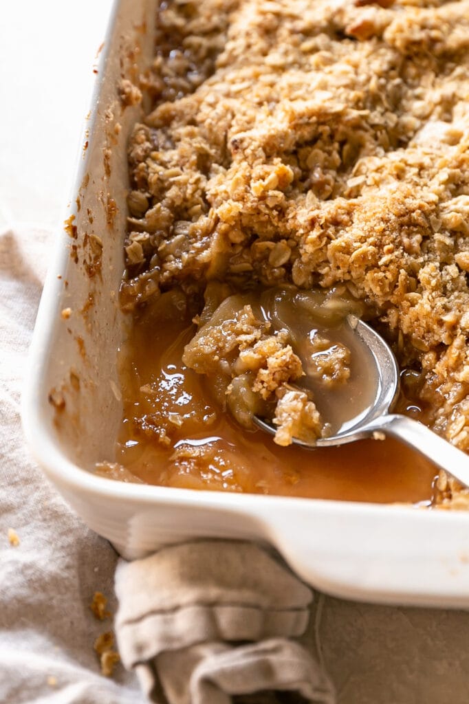 Apple Crisp Being Scooped with a Spoom