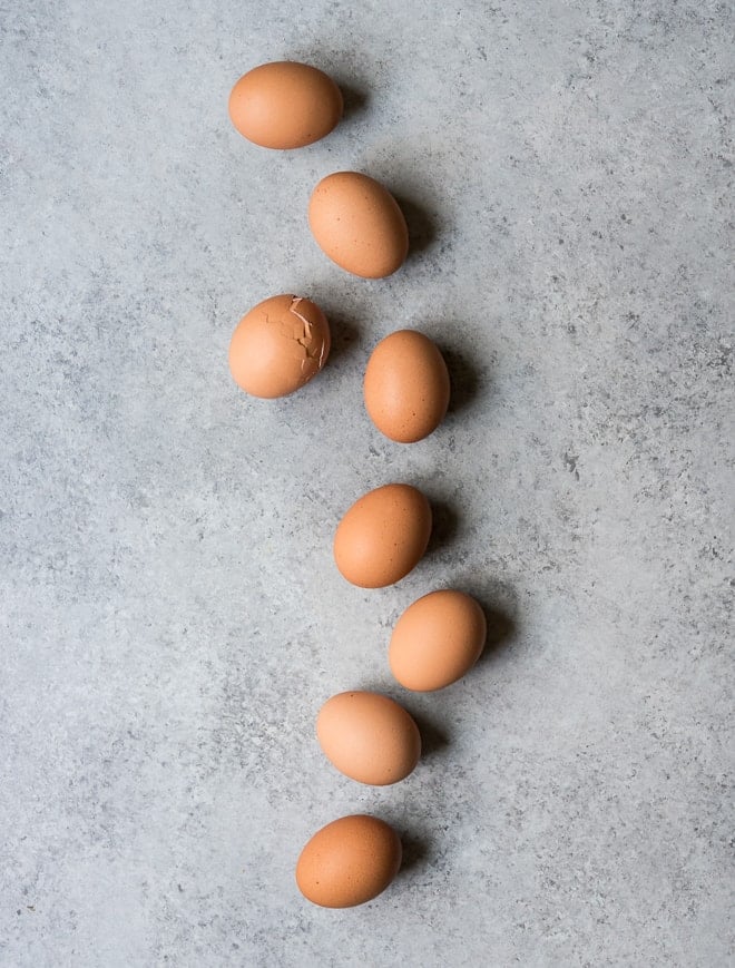 hard boiled eggs on a grey background