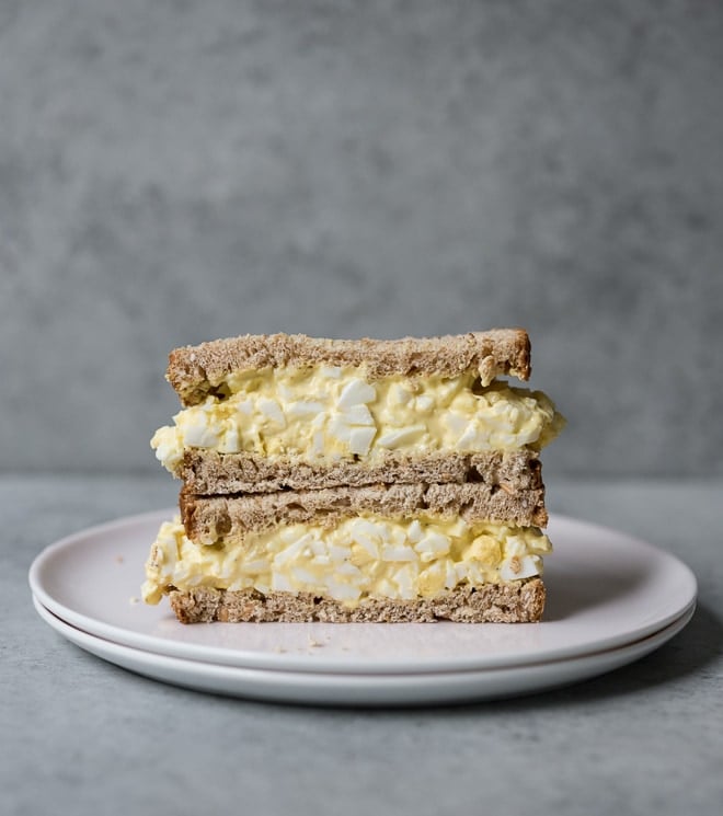 Egg Salad sandwich piled high on a plate