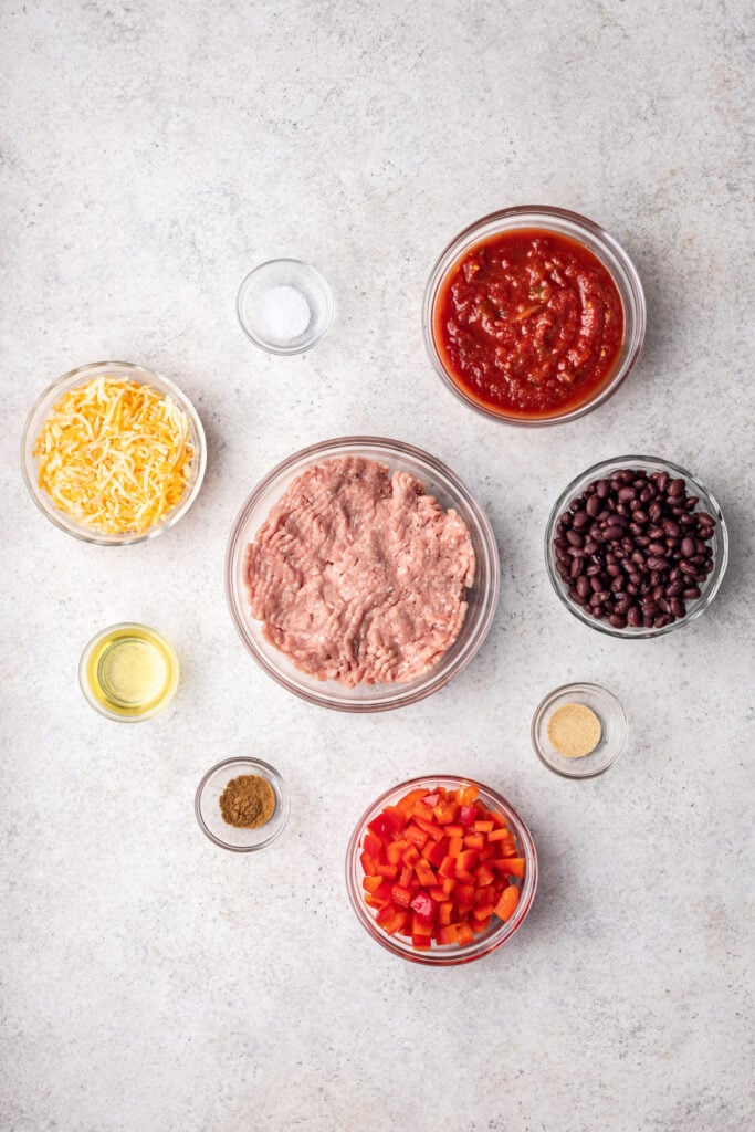 ingredients in bowls on a grey background