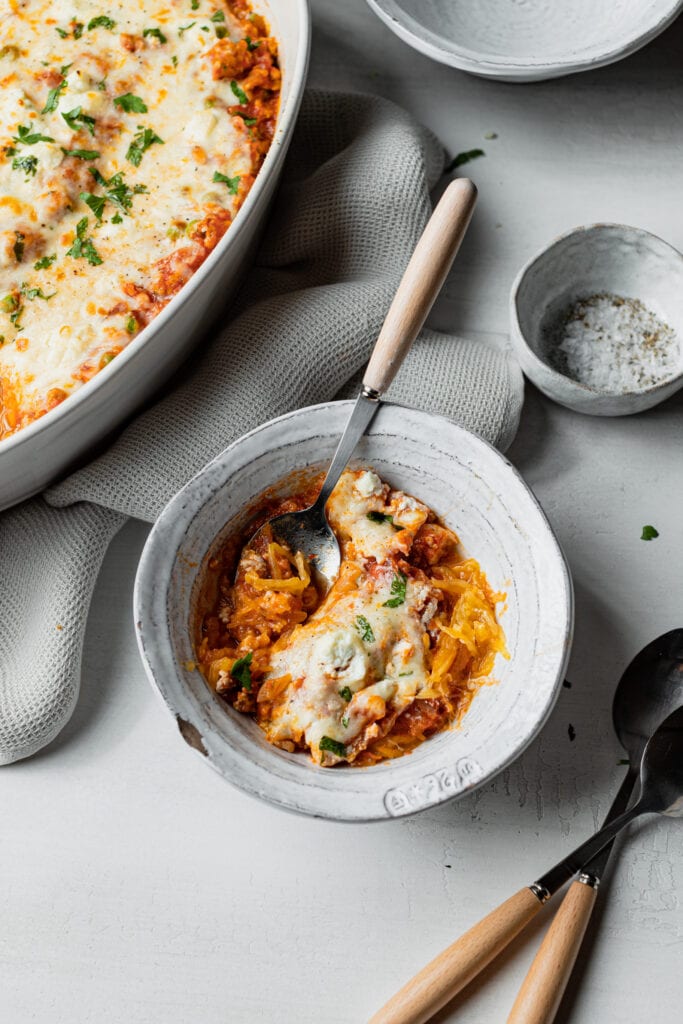 spaghetti squash casserole in a white bowl