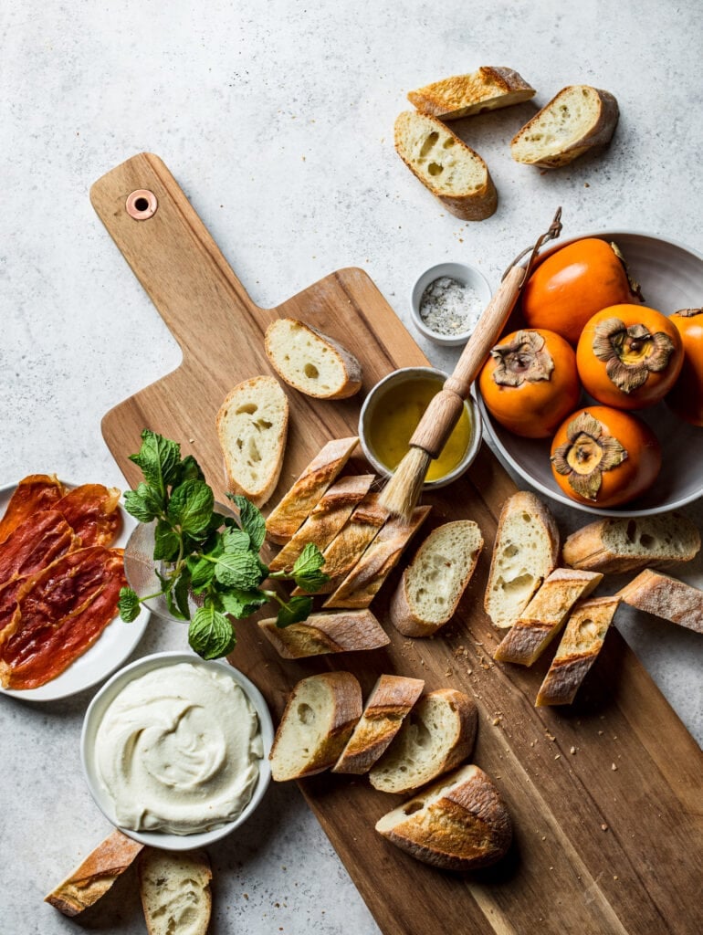 Persimmon Crostini with Crispy Prosciutto and Whipped Ricotta