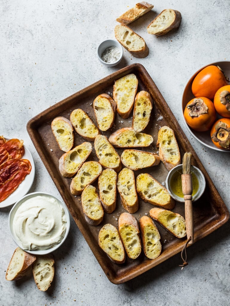 Persimmon Crostini with Crispy Prosciutto and Whipped Ricotta