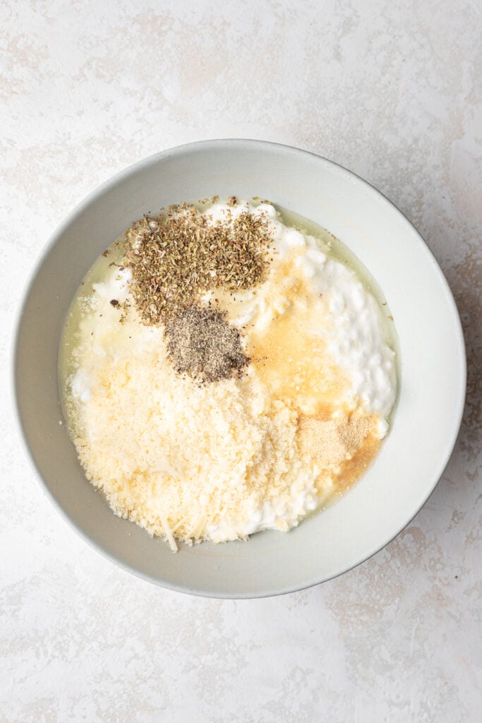 bowl of cottage cheese, parmesan and spices