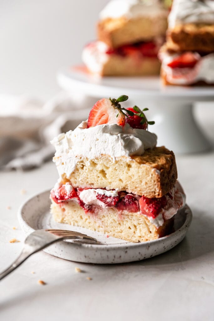 close up shot of piece of layered strawberry shortcake