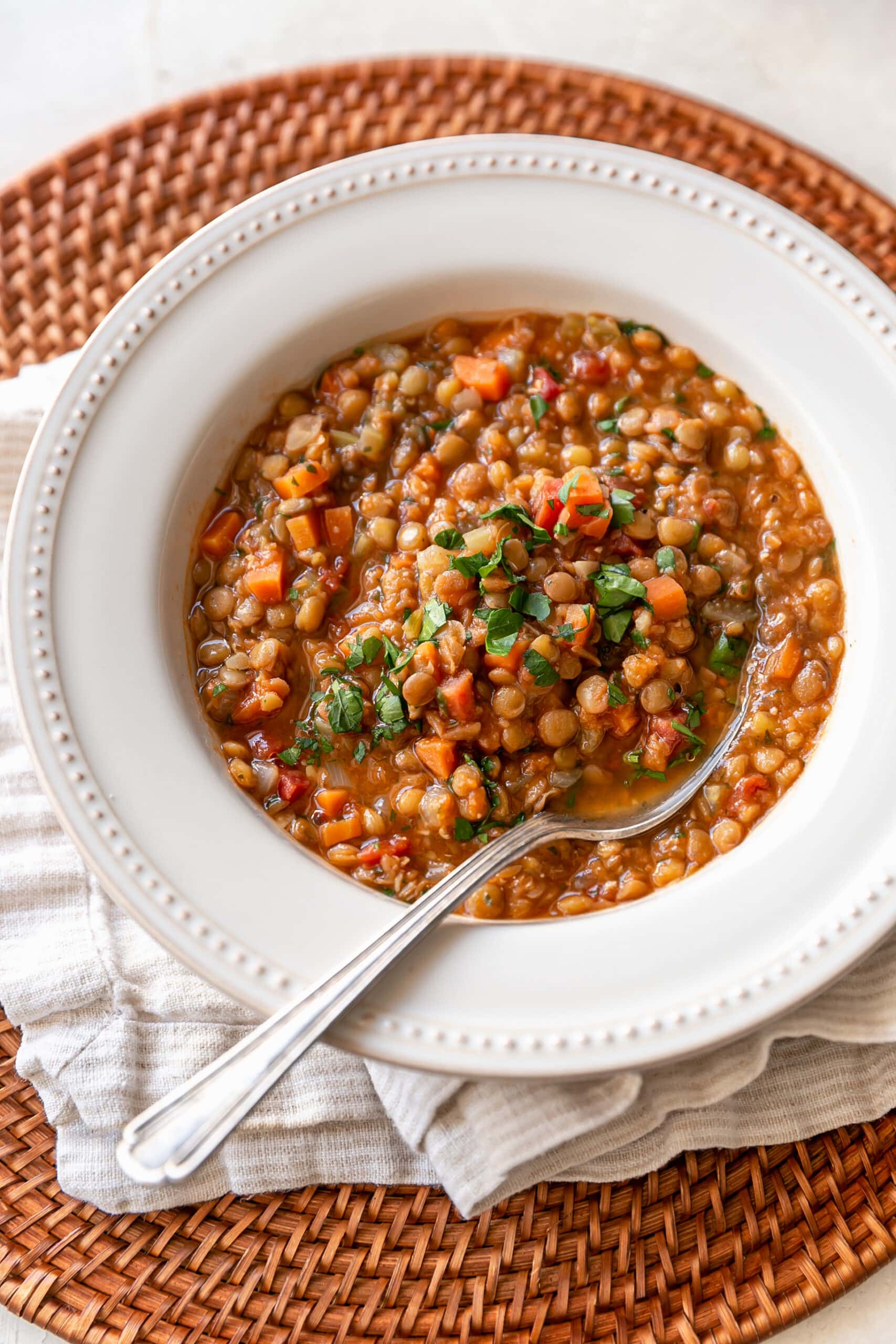 LIBAD Easy Stove Top Lentil Soup - close up of soup in white bowl with spoon