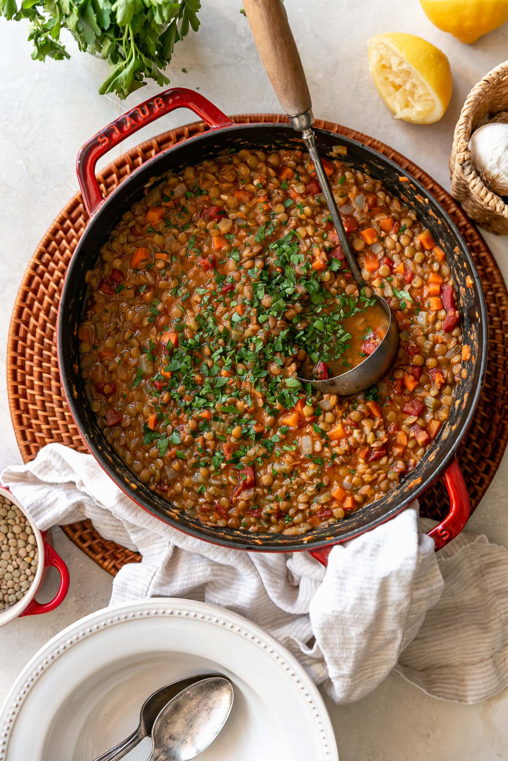 Easy Stove Top Lentil Soup in Red Pot with Ladle and Bowls