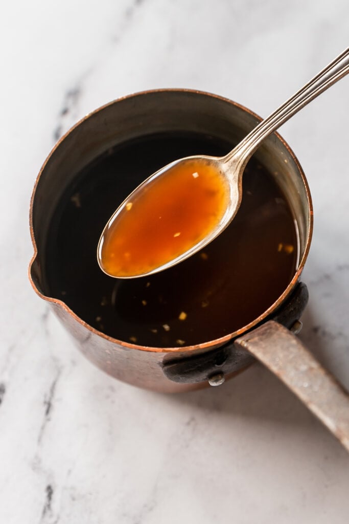 Homemade Teriyaki Sauce: teriyaki sauce on spoon in saucepan