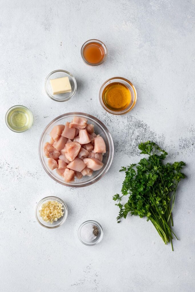 photo of ingredients such as chicken, herbs, garlic and honey