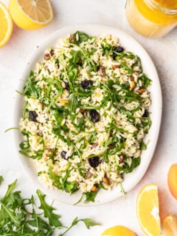 orzo salad on a white platter