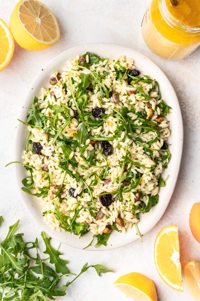 orzo salad on a white platter