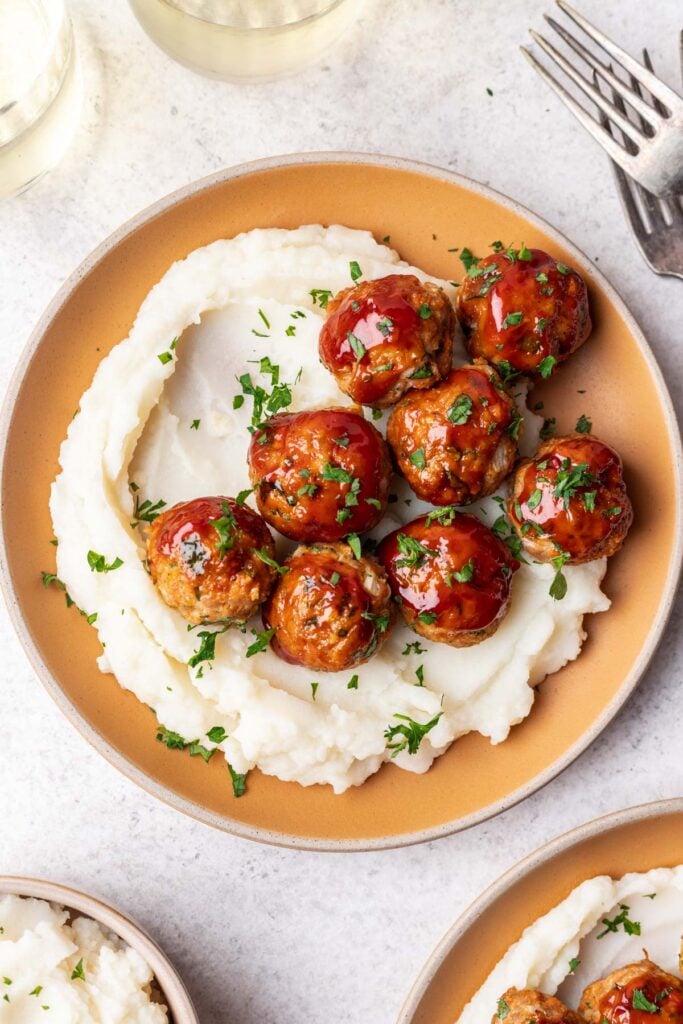 meatballs on a plate with mashed potatoes
