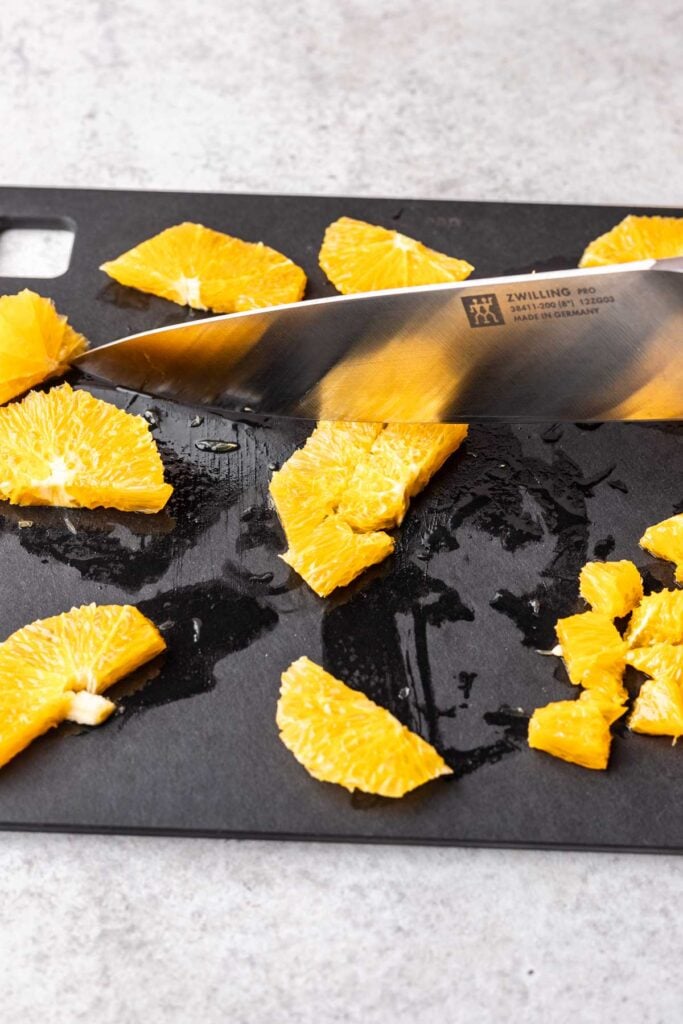 oranges sliced on a cutting board