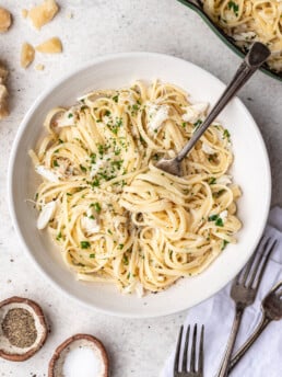 crab pasta in a bowl with a fork