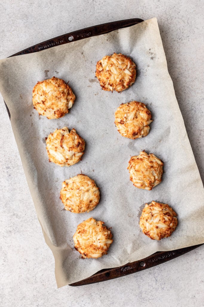 baked crab cakes on a sheet pan