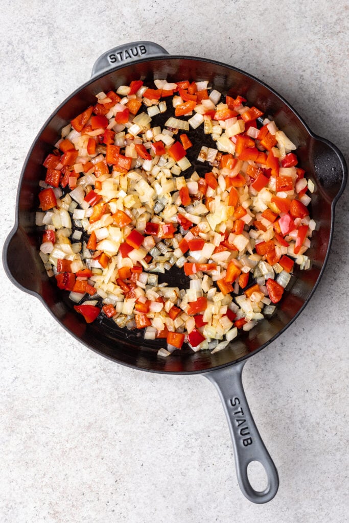 skillet with onions and peppers