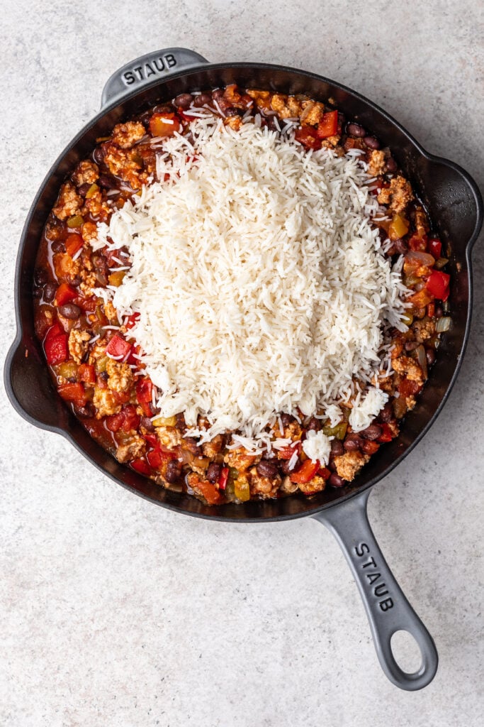 mexican ground turkey skillet with white rice piled on top