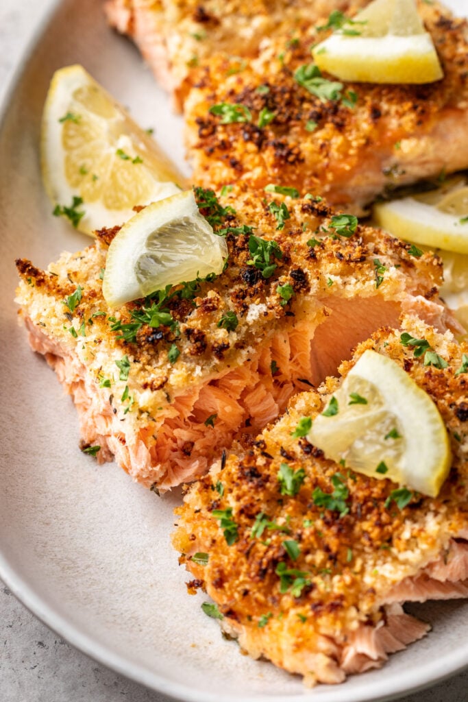 baked panko crusted salmon with parsley and lemon slices