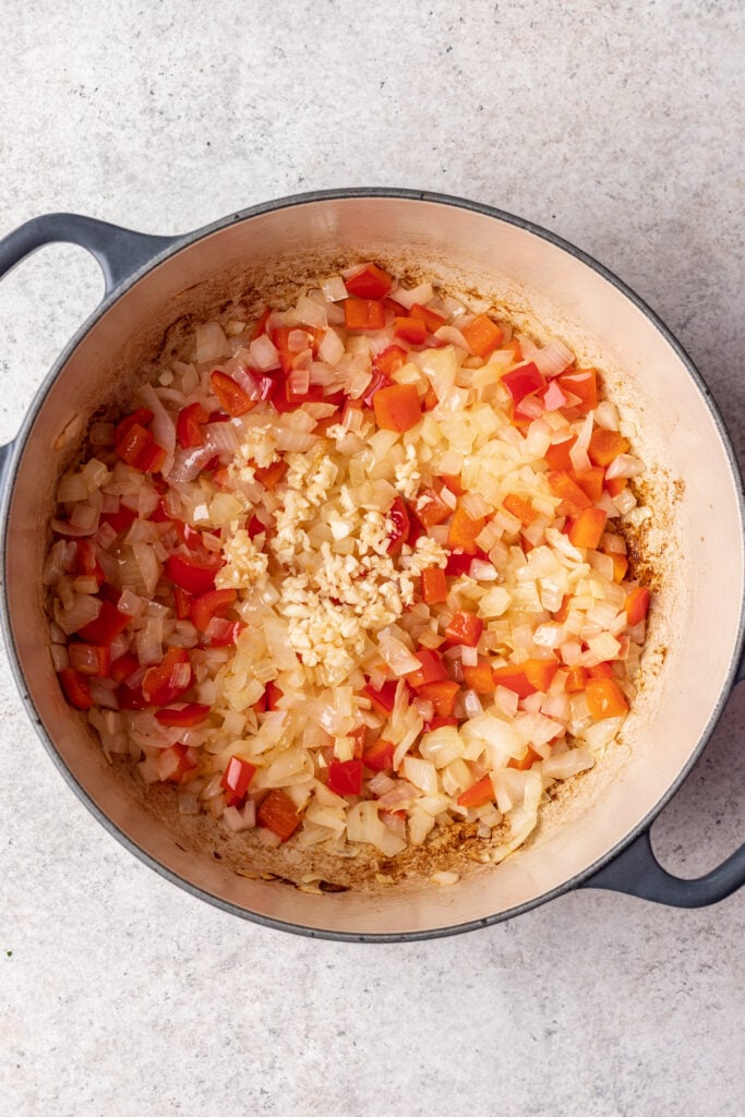 pot with sauteed onions and bell peppers