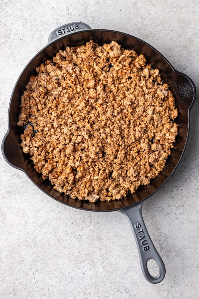 ground meat in a skillet with spices