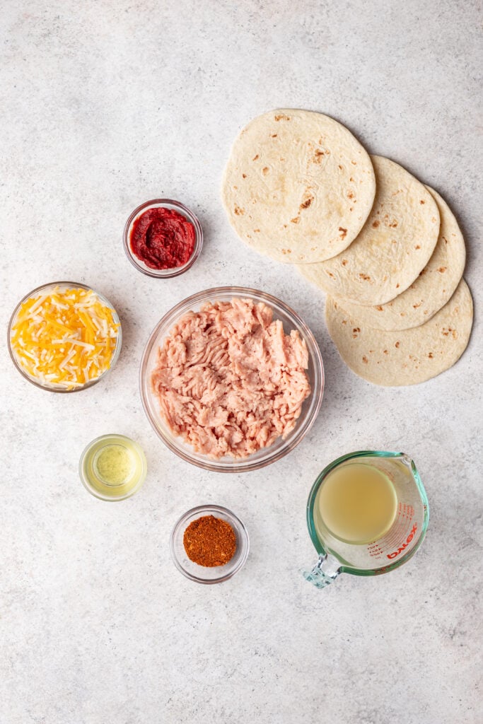 ingredients in bowls on a grey background