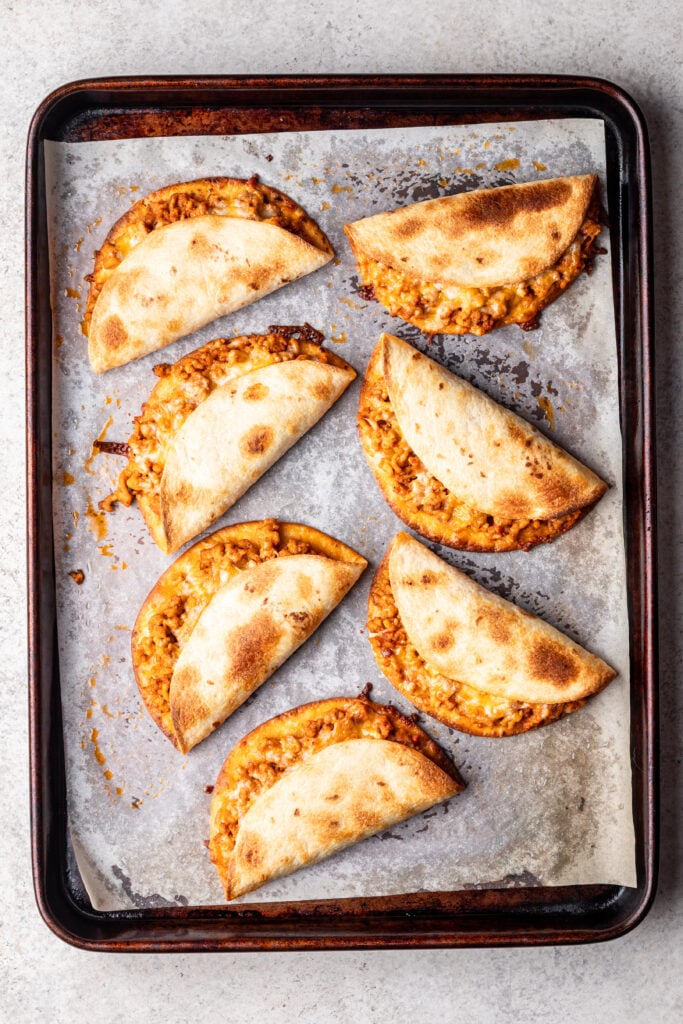 crispy ground chicken tacos on a sheet pan