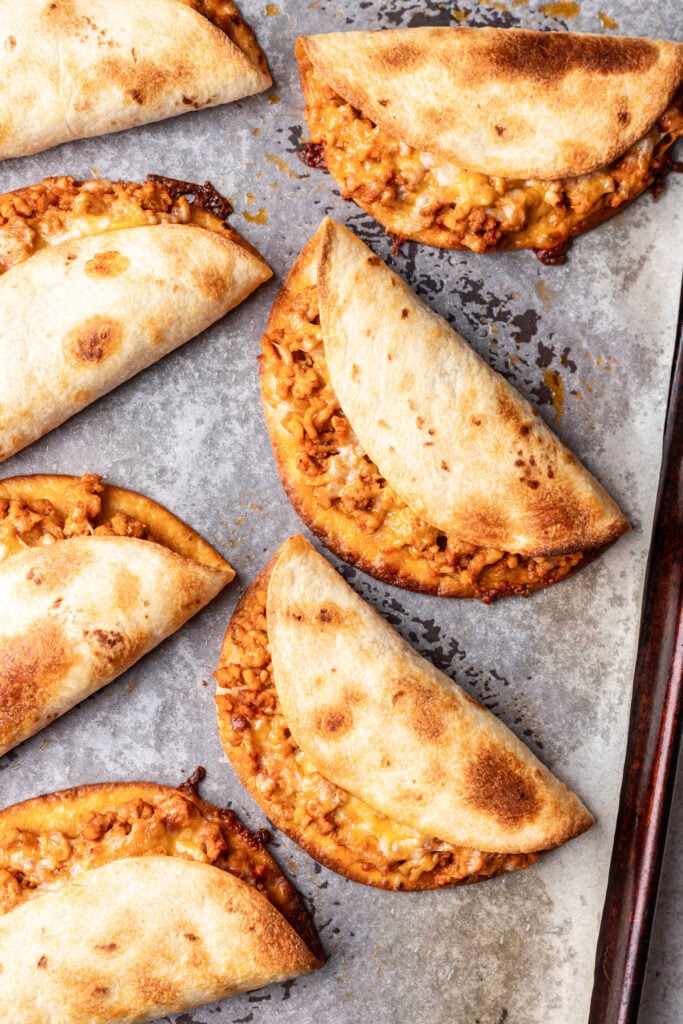 crispy ground chicken tacos on a sheet pan