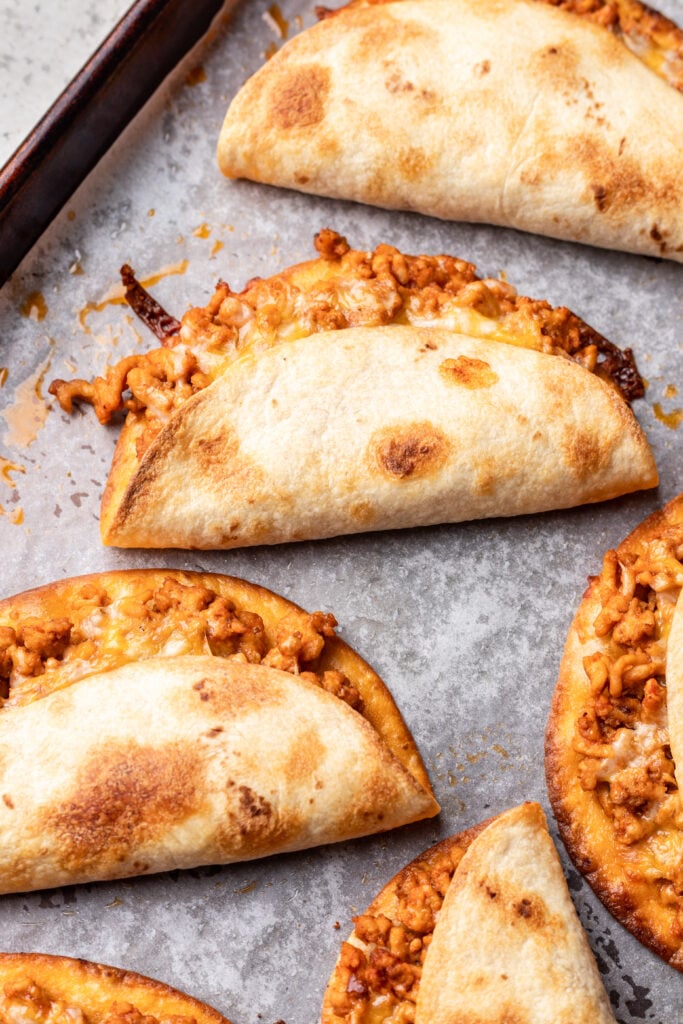 crispy ground chicken tacos on a sheet pan