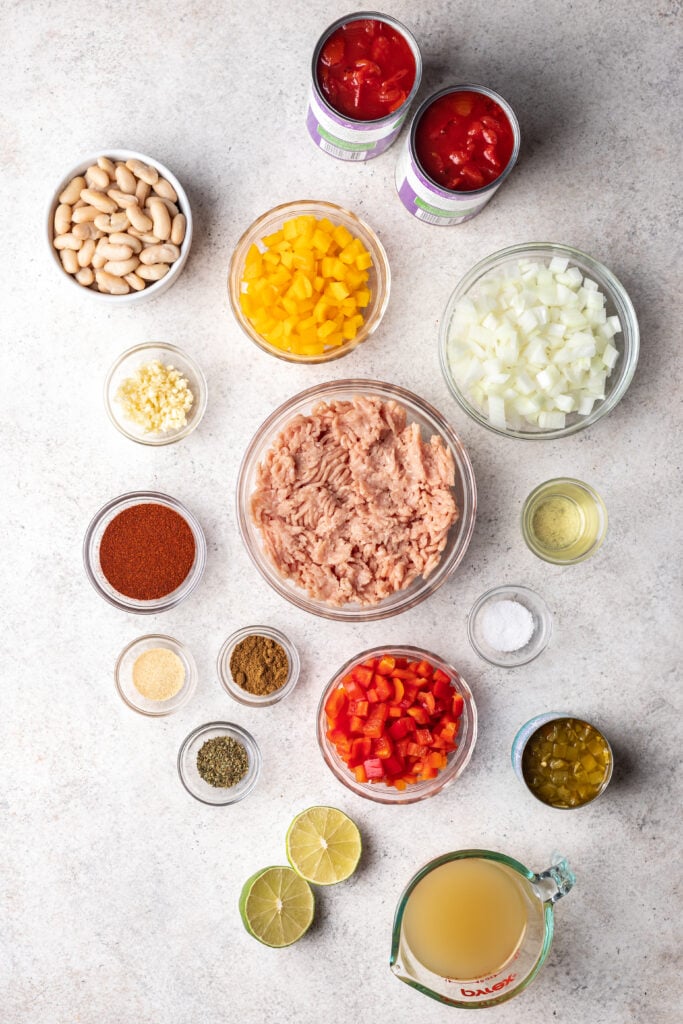 bowls of ingredients on a grey background