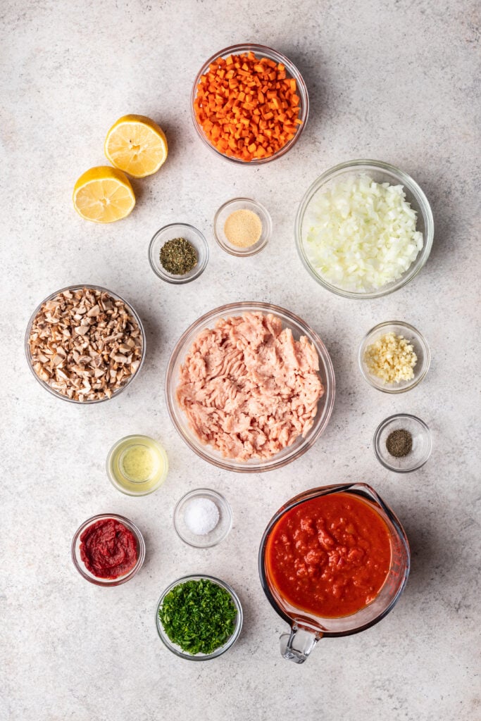 bowls of ingredients on a grey background