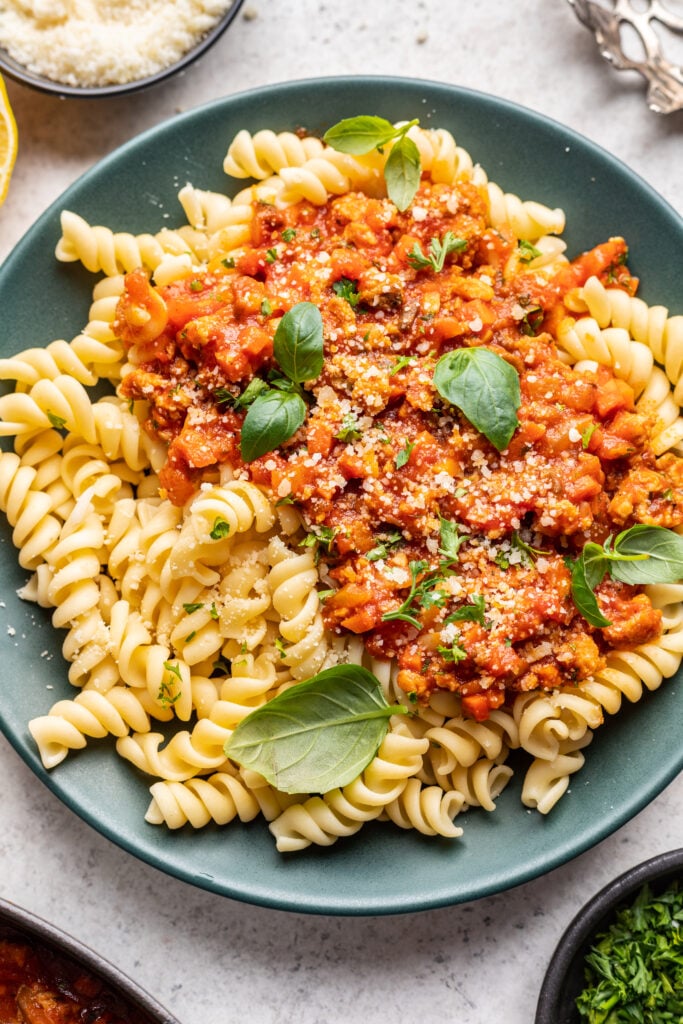 ground chicken bolognese over pasta