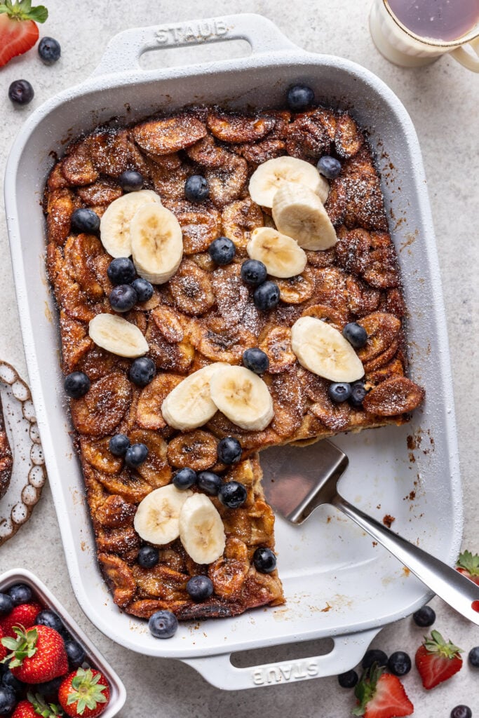 baked banana cinnamon french toast with a slice taken out