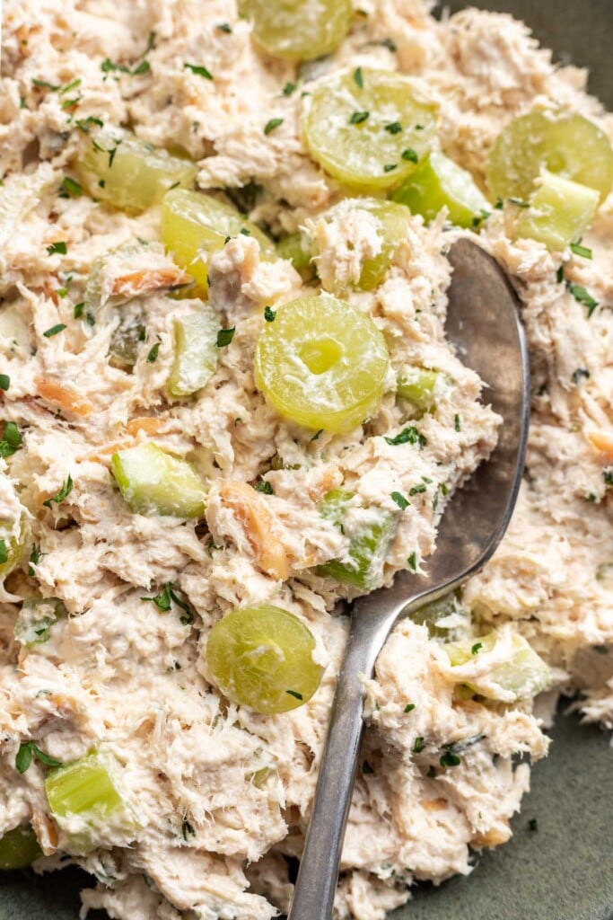 chicken salad on a spoon in a bowl