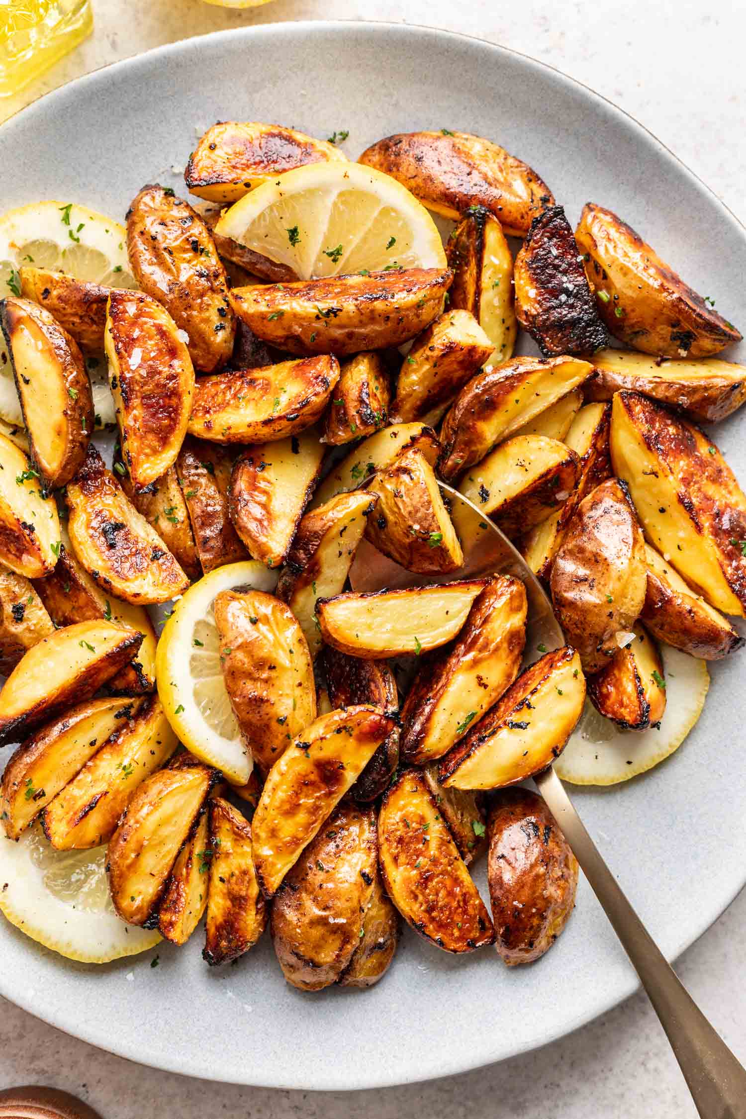 roasted potatoes in a white bowl